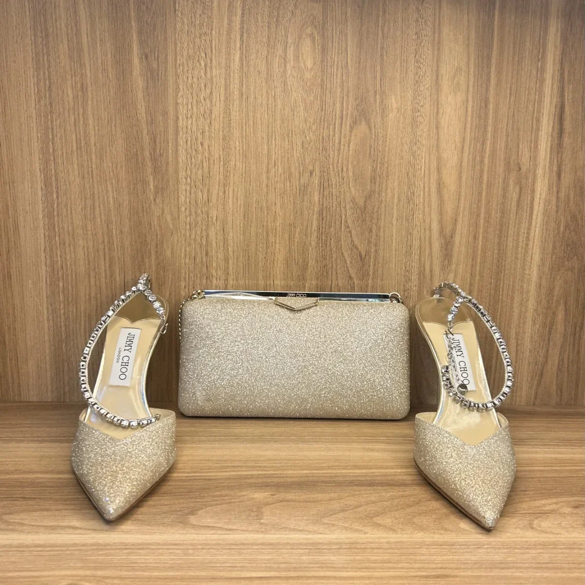 Saeda 100 pumps,crafted in platinum ice dusty -crystal embellished ankle strap with matching ellipse clutch bag