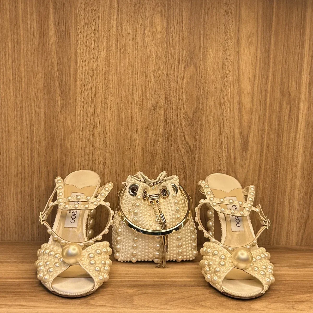 Jimmy choo Bon Bon Faux Pearl-embellished satin bucket in ivory with a gold-tone hoop handle with matching sacaria 120 platforms