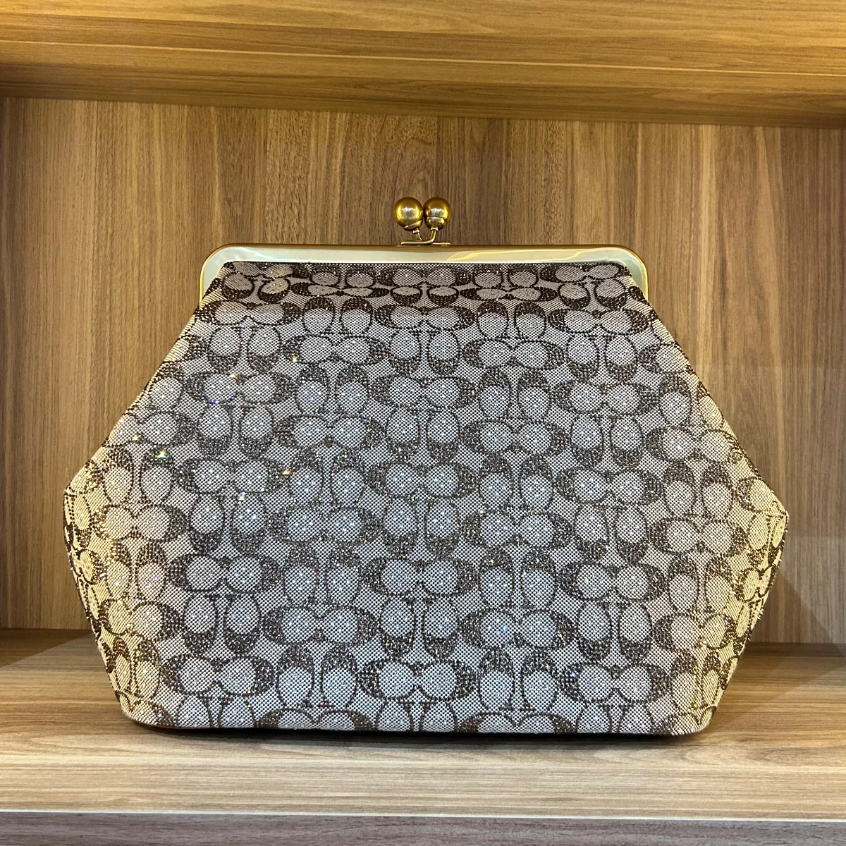 Large Kisslock signature jacquard frame bag